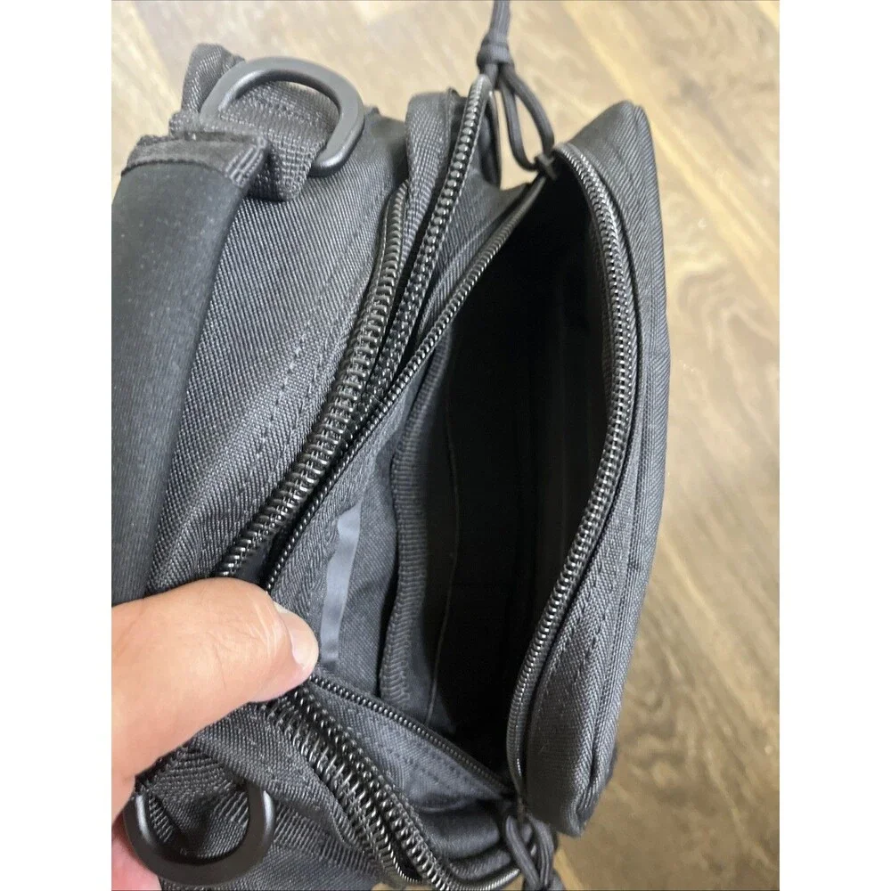 YUKON OUTFITTERS Men's Black Sling Bag (Single Strap) Pockets Backpack